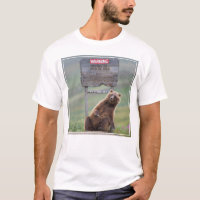 Grizzly Bear Plays With Sign