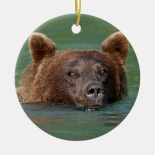 grizzly bear swimming ceramic ornament