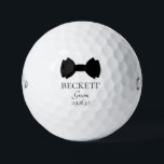 Groom Black Bow Tie Golf Balls<br><div class="desc">These golf balls are a great favor for the groom. If all your wedding party will be wearing suits with bow ties this design with a traditional double bow tie in black would be perfect. They'd be great for a bachelor party or weekend. The job title can be changed to...</div>