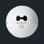 Groom Black Bow Tie Golf Balls<br><div class="desc">These golf balls are a great favor for the groom. If all your wedding party will be wearing suits with bow ties this design with a traditional double bow tie in black would be perfect. They'd be great for a bachelor party or weekend. The job title can be changed to...</div>