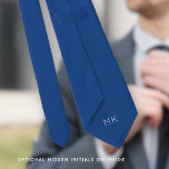 Groom Groomsmen Initials Blue Wedding Neck Tie<br><div class="desc">Groom Groomsmen Initials Mid Blue Wedding. Hidden on the back you can easily personalise the initials so there can be no mistaking who's tie belongs to who! The color and font of the initials and also the tie color can be changed if you so wish to match your own wedding...</div>