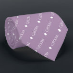 Groom - Repeating White Text on Lavender Neck Tie<br><div class="desc">This fun neck tie is the perfect accessory for the groom at your wedding. It features a simple yet elegant design with the word "Groom" written in a decorative all capital white font, and repeating in a diagonal pattern with diamond separators on a light purple or lavender background. Perfect for...</div>