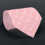 Groom - Repeating White Text on Pink Neck Tie<br><div class="desc">This fun neck tie is the perfect accessory for the groom at your wedding. It features a simple yet elegant design with the word "Groom" written in a decorative all capital white font, and repeating in a diagonal pattern with diamond separators on a pink or blush rose colored background. Perfect...</div>