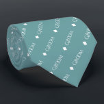 Groom - Repeating White Text on Teal Neck Tie<br><div class="desc">This fun neck tie is the perfect accessory for the groom at your wedding. It features a simple yet elegant design with the word "Groom" written in a decorative all capital white font, and repeating in a diagonal pattern with diamond separators on a teal, aqua, or turquoise colored background. Perfect...</div>