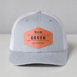 Groom Wedding Party Leather Patch Hat<br><div class="desc">Celebrate the groom in style with this personalized Groom Leather Patch Trucker Hat, a perfect accessory for wedding day festivities, bachelor parties, rehearsal dinners, or getting-ready photos. This custom hat features a rugged leather patch with the bride and groom’s initials and wedding date—giving it a modern, masculine look that stands...</div>