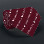 Groomsman Repeating White Text on Burgundy Neck Tie<br><div class="desc">This fun neck tie is the perfect accessory for the groomsmen at your wedding. It features a simple yet elegant design with the word "groomsman" written in fancy all capital white text repeating in a diagonal pattern on a burgundy or maroon background. Perfect way to add a bit of class...</div>