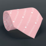 Groomsman Repeating White Text on Pink Neck Tie<br><div class="desc">This fun neck tie is the perfect accessory for the groomsmen at your wedding. It features a simple yet elegant design with the word "groomsman" written in fancy all capital white text repeating in a diagonal pattern on a blush rose or pink colored background. Perfect way to add a bit...</div>