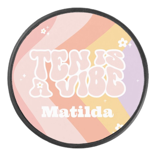 groovy rainbow ten is a vibe 60's retro daisy cool hockey puck (Front)