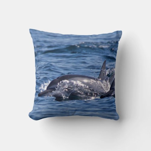 Group of bottlenose dolphins throw pillow