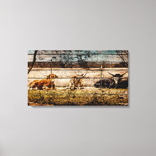 Group of Longhorns Laying in Field Distressed Wood Canvas Print