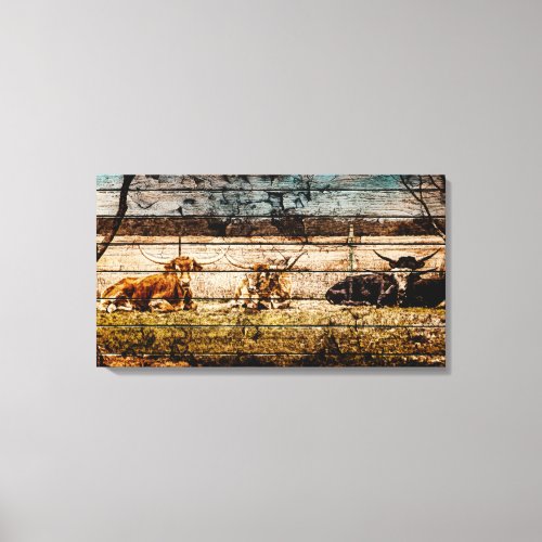 Group of Longhorns Laying in Field Distressed Wood Canvas Print