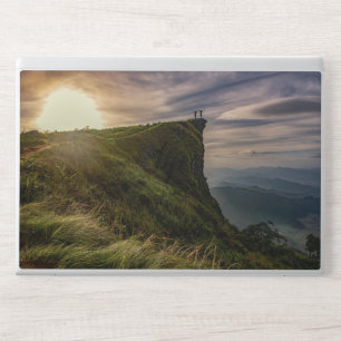 Group of people standing on a cliff edge 840 HP laptop skin