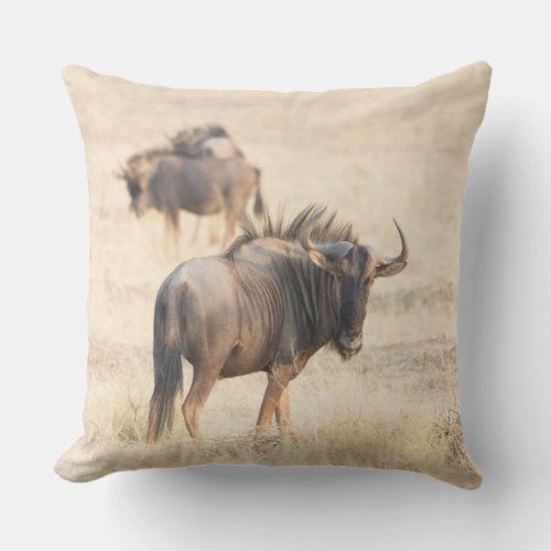 Group of wildebeest outdoor pillow