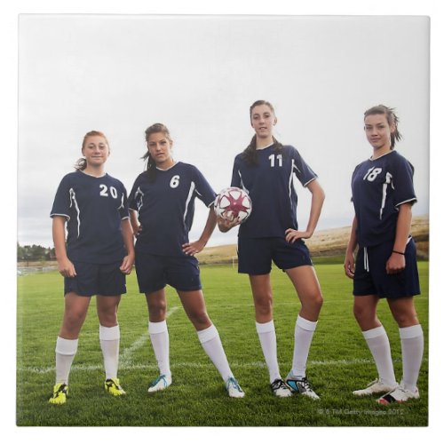 group portait of teen girl soccer players ceramic tile