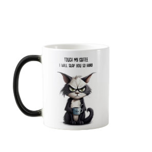 Grumpy cat with cup of coffee
