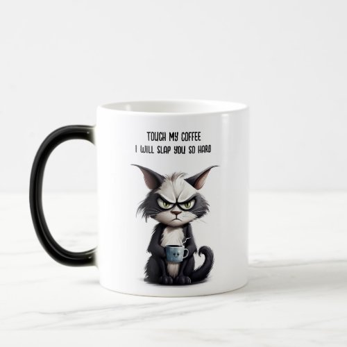 Grumpy cat with cup of coffee
