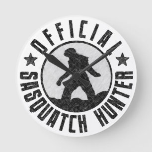 Grunge Cool Sasquatch Bigfoot Hunter. Round Clock