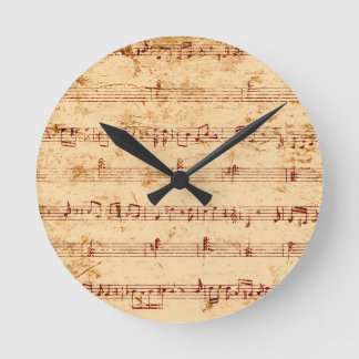 Grunge piano notes music sheet round clock