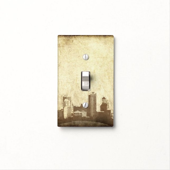 Grungy city background light switch cover (In Situ)