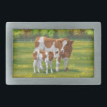 Guernsey Cow & Cute Calf in Summer Pasture Belt Buckle<br><div class="desc">The Guernsey breed of cattle gets its name from the island of Guernsey in the Channel Islands. It can range from a light tan and white to a reddish-brown and white. This brown and white often has a spotting pattern similar to a Holstein but is brownish instead of black. They...</div>