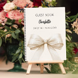 Guest book beige cream bow SWEET 16<br><div class="desc">A beige,  cream background color. Decorated with a large bow.  Personalize and add your name,  text.</div>