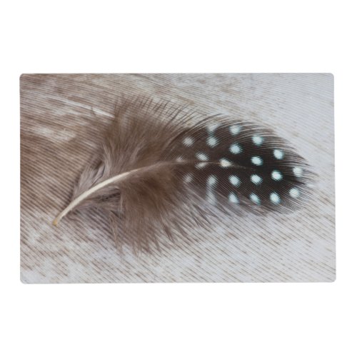 Guinea fowl and goose feather placemat