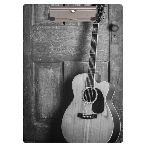 Guitar Leaning Against Door in Black and White Clipboard