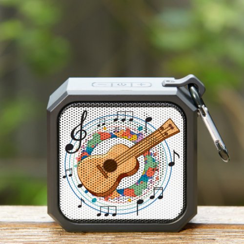 Guitar surrounded with Musical Notes Bluetooth Speaker