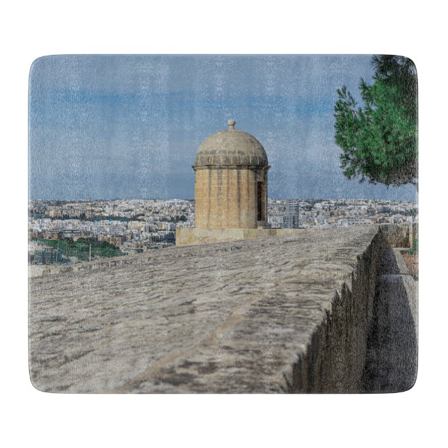 Gun turret on old city walls in Valletta, Malta Cutting Board (Front)