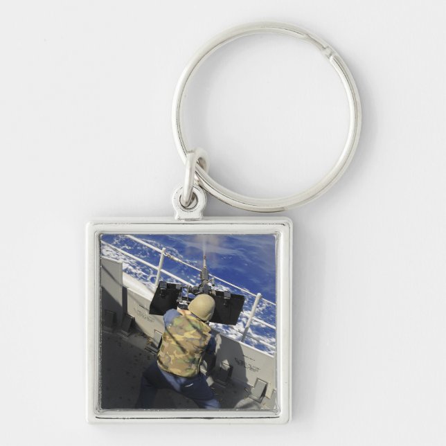 Gunners Mate firing a 50 caliber machine gun Keychain (Front)