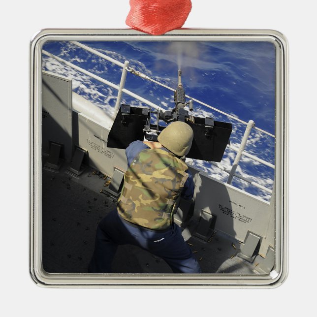 Gunners Mate firing a 50 caliber machine gun Metal Ornament (Front)