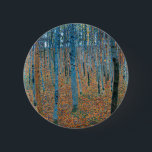 Gustav Klimt Beech Tree Forest Grove Button<br><div class="desc">This is based on classic nature painting artworks by Gustav Klimt, Beech Grove 1, 1902. The artwork portrays a dense forest of tall, slender birch trees, with pale trunks marked by dark, vertical lines. The foliage is depicted in shades of blue, green, and yellow, adding a sense of depth and...</div>