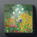 Gustav Klimt Flower Garden Plaque<br><div class="desc">Gustav Klimt Flower Garden plaque. Oil painting on canvas from 1907. Completed during his golden phase, Flower Garden is one of Klimt’s most famous landscape paintings. The summer colors burst forth in this work with a beautiful mix of orange, red, purple, blue, pink and white blossoms. A great gift for...</div>