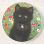 Gustav Klimt Kitten Coaster<br><div class="desc">Sandstone Coaster featuring a Gustav Klimt kitten! This black kitty wears a silver collar and sits in a field of red,  blue,  white,  and yellow flowers. A wonderful gift for cat lovers and Austrian art enthusiasts!</div>