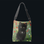 Gustav Klimt Kitten Crossbody Bag<br><div class="desc">Crossbody Bag featuring a Gustav Klimt kitten! This black kitty wears a silver collar and sits in a field of red,  blue,  white,  and yellow flowers. A wonderful gift for cat lovers and Austrian art enthusiasts!</div>