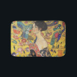 Gustav Klimt Lady With Fan Art Nouveau Painting Bathroom Mat<br><div class="desc">Gustav Klimt Lady With Fan Art Nouveau Painting This half portrait of a beautiful woman shows a yellow background with asiatic ornaments, colorful birds and lotus flowers. The lady wears a dress in the style of a kimono imprinted with motives of a Chinese dragon dress. Beautiful artistic romantic decorative fine...</div>