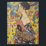Gustav Klimt Lady With Fan Art Nouveau Painting Notebook<br><div class="desc">Gustav Klimt Lady With Fan Art Nouveau Painting This half portrait of a beautiful woman shows a yellow background with asiatic ornaments, colorful birds and lotus flowers. The lady wears a dress in the style of a kimono imprinted with motives of a Chinese dragon dress. Beautiful artistic romantic decorative fine...</div>