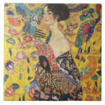 Gustav Klimt Lady With Fan Art Nouveau Painting Tile<br><div class="desc">Gustav Klimt Lady With Fan Art Nouveau Painting This half portrait of a beautiful woman shows a yellow background with asiatic ornaments, colorful birds and lotus flowers. The lady wears a dress in the style of a kimono imprinted with motives of a Chinese dragon dress. Beautiful artistic romantic decorative fine...</div>