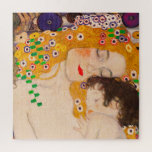 Gustav Klimt - Mother and Child Jigsaw Puzzle<br><div class="desc">Gustav Klimt  -  Mother and Child - Mother and Child is a detailed section of the 1905 Three Ages of Woman painting. This painting is also known as,  "Le Tre Eta Della Donna". In this image,  we focus only on a part of the artwork,  the mother and the child.</div>