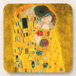 Gustav Klimt The Kiss Beverage Coaster<br><div class="desc">Coasters featuring Gustav Klimt’s oil painting with gold leaf The Kiss (1908). A man and woman,  wearing brilliant golden colors,  lovingly embrace and kiss in a field of flowers. A great gift for fans of Art Nouveau and Austrian art.</div>