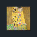 Gustav Klimt The Kiss Canvas Print<br><div class="desc">The Kiss is the most iconic and famous painting by Gustav Klimt. It's a beautiful golden painting of a couple deeply in love sharing a romantic moment of a passionate kiss. Get your high quality gift ideas and wonderful products featuring this wonderful masterpiece. Check out our store fore more Klimt...</div>