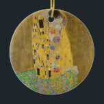 Gustav Klimt "The Kiss" Ceramic Ornament<br><div class="desc">Gustav Klimt 's masterpiece: "The Kiss". “The Kiss, ” created by the Austrian painter Gustav Klimt. It’s considered to be his most famous work. He painted it between the years 1907 and 1908, which were the highpoint of his “Golden Period, ” when he painted a number of works utilizing gold...</div>