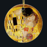 Gustav Klimt The Kiss Classic Painting Ceramic Ornament<br><div class="desc">Gustav Klimt The Kiss Gustav Klimt used real gold in his beautiful work of art nouveau women and decorative art. This Klimt painting was called "The Kiss" and is the most well-known art nouveau work he ever painted. The Gustav Klimt painting is of an art nouveau woman and man in...</div>