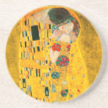 Gustav Klimt The Kiss Coaster<br><div class="desc">Sandstone Coaster featuring Gustav Klimt’s oil painting with gold leaf The Kiss (1908). A man and woman,  wearing brilliant golden colors,  lovingly embrace and kiss in a field of flowers. A great gift for fans of Art Nouveau and Austrian art.</div>