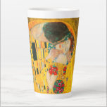 Gustav Klimt The Kiss Latte Mug<br><div class="desc">Latte Mug featuring Gustav Klimt’s oil painting with gold leaf The Kiss (1908). A man and woman,  wearing brilliant golden colors,  lovingly embrace and kiss in a field of flowers. A great gift for fans of Art Nouveau and Austrian art.</div>