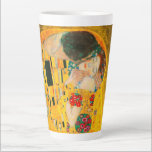 Gustav Klimt The Kiss Latte Mug<br><div class="desc">Latte Mug featuring Gustav Klimt’s oil painting with gold leaf The Kiss (1908). A man and woman,  wearing brilliant golden colors,  lovingly embrace and kiss in a field of flowers. A great gift for fans of Art Nouveau and Austrian art.</div>