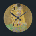 Gustav Klimt "The Kiss" Round Clock<br><div class="desc">Gustav Klimt 's masterpiece: "The Kiss". “The Kiss, ” created by the Austrian painter Gustav Klimt. It’s considered to be his most famous work. He painted it between the years 1907 and 1908, which were the highpoint of his “Golden Period, ” when he painted a number of works utilizing gold...</div>