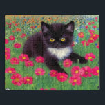 Gustav Klimt Tuxedo Cat Jigsaw Puzzle<br><div class="desc">Puzzle featuring a Gustav Klimt tuxedo cat! This adorable black and white kitty sits in a field of red,  blue,  white,  and orange flowers. An awesome gift for cat lovers and Austrian art enthusiasts!</div>