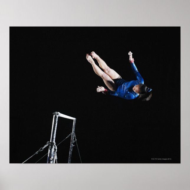 Gymnast (16-17) dismounting uneven bars poster (Front)
