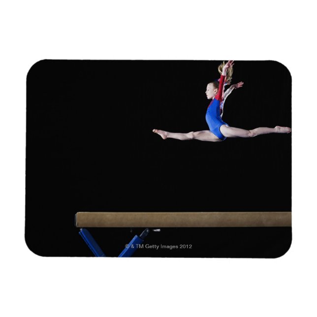 Gymnast (9-10) leaping on balance beam 2 magnet (Horizontal)